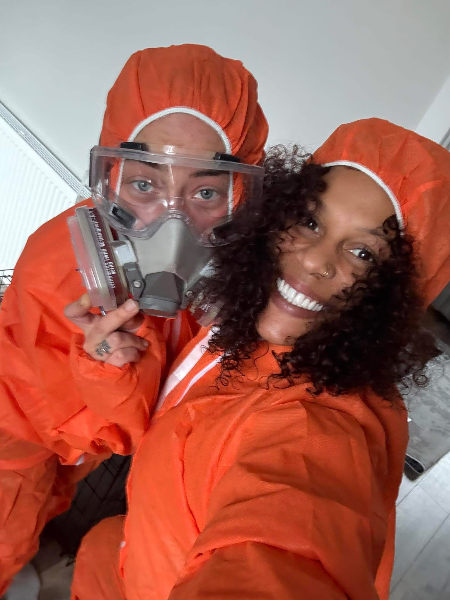 Cherrelle and team in protective equipment - 2 of a Kind Cleaning Company